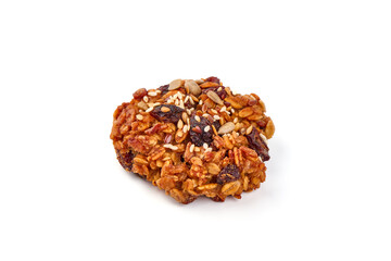 Homemade oat cookies with seeds, isolated on white background.