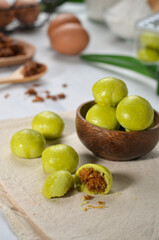 Klepon  is a cookies of sweet  balls filled with molten palm sugar and grated coconut. 