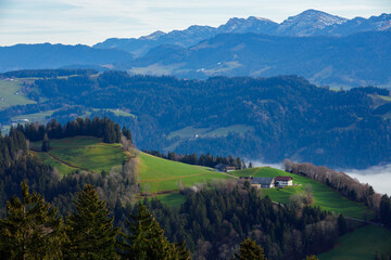 Fototapeta na wymiar Beautiful landscape of Pfander mountains, Austria. Blue sky and green valley