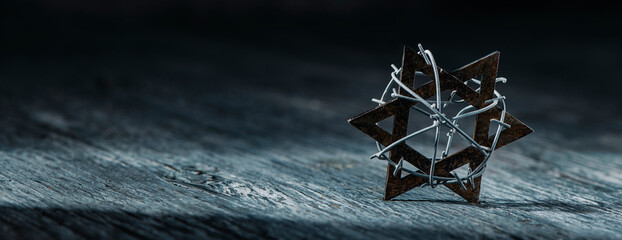 star of david tied with barbed wire, web banner