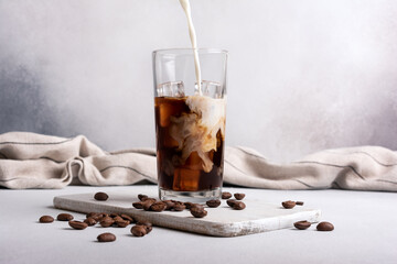 Morning ice coffee with milk or latter in glass
