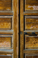 Texture of an old wooden brown door