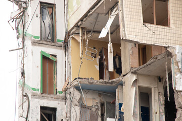 Naklejka premium A house blown up by a Russian rocket in the city of Dnipro on Pobeda Street in Ukraine, War in Ukraine, a rocket attack on civilians in their homes 2023
