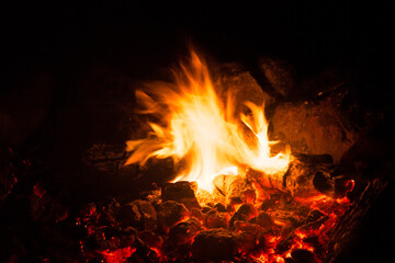 flames of fire, campfire  with stones around
