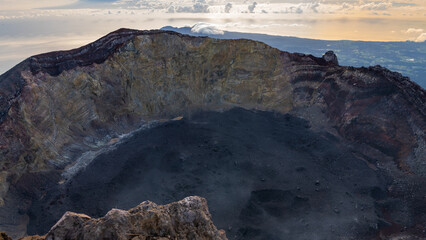 Sunrise at the top of the Ijen volcano. Panoramic view of East Java, Indonesia. The background of the natural landscape.