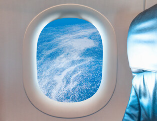 View from airplane of melting polar ice cap Greenland as seen through window of an commerical...