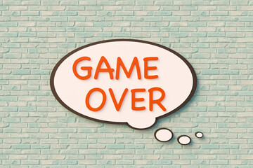 Game Over, cartoon speech bubble. Orange letters against a slightly bluish brick wall. Leisure games, challenge and gambling concept. 3D illustration