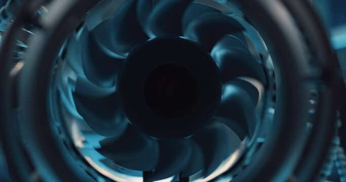 Zoom In Close Up Footage From Inside of a Combustion Chamber of an Advanced Futuristic Turbine Engine with a Rotating Fan. Modern Industrial Jet Engine in Research and Development Facility