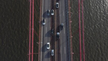 Aerial view of 25th April Bridge in Lisbon, Portugal. Famous landmark on river Tagus. High quality photo