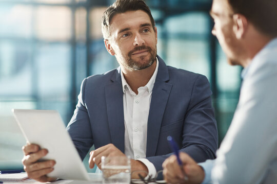 Tablet, teamwork and business people in meeting in office workplace. Collaboration, digital technology and men or workers with touchscreen planning sales, analysis or strategy in company - Powered by Adobe