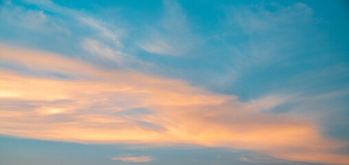 Fototapeta na wymiar Beautiful bright sunset sky with clouds. Sunset sky background.
