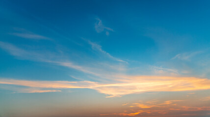 Fototapeta na wymiar Beautiful bright sunset sky with clouds. Sunset sky background.