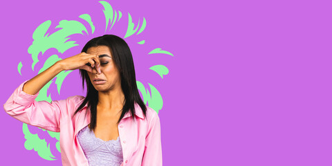 African american woman standing over isolated over purple background smelling something stinky and disgusting, intolerable smell, holding breath with fingers on nose. bad smell.