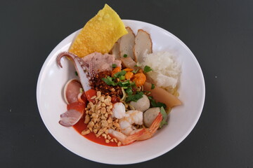 dried seafood noodle in pink soup, Yen Ta Four Noodles in Thai style
