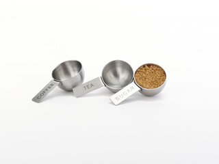 measuring cups and brown sugar