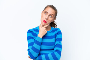 Young caucasian woman isolated on white background having doubts