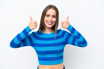 Young pretty caucasian woman isolated on white background giving a thumbs up gesture