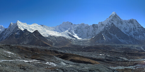 Ama Dablam mountain landscape - trekking in the Himalaya, Nepal. View from Chukhung Ri mountain. Himalaya landscape and mountain views.