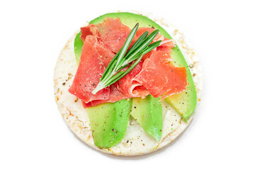 Rice Cake Sandwich with Fresh Avocado, Jamon and Rosemary - Isolated on White. Easy Breakfast. Diet Food. Quick and Healthy Sandwiches. Crispbread with Tasty Filling. Healthy Dietary Snack - Isolation