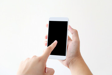 Hand holding blank screen phone or smartphone or tablet for template on white background.