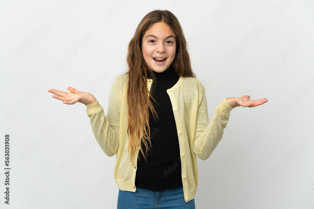 Wall mural Little girl over isolated white background with shocked facial expression