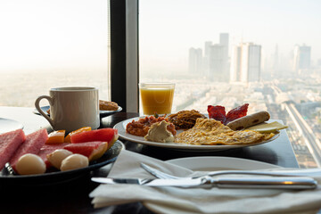 breakfast with an amazing view of Dubai. breakfast at the hotel with Arabic food on the background...