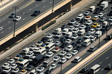 Lanes of wide city street with lots of cars. traffic jam on the road. © diy13