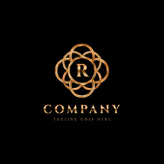 Luxury gold logo - ornamental monogram design template. Calligraphic elegant initial letters crest vector. Business sign, monogram identity for restaurant, boutique, hotel, heraldic, jewelry.