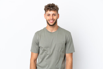 Fototapeta premium Young caucasian handsome man isolated on white background laughing