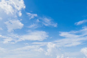 White fluffy clouds on beautiful clearly deep blue sky in a sunny day