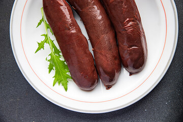 black pudding or bloody sausage healthy meal food snack on the table copy space food background rustic top view