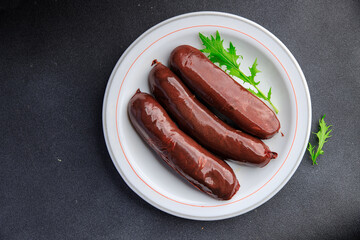 black pudding or bloody sausage healthy meal food snack on the table copy space food background rustic top view