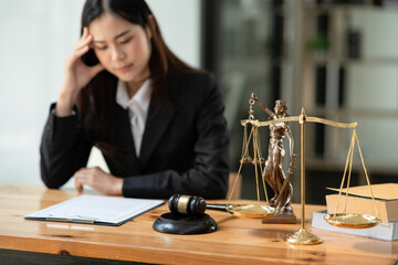 Lawyers having  Concepts of  Legal services at the law office work Legal advice online on computer labor law