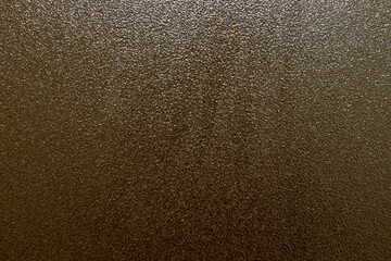 ざらざらした質感の黒い壁