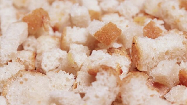 Salty crackers soaked in garlic sauce