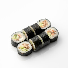 Maki rolls with tuna and avocado. Healthy and useful feed. Set of rolls. Isolate on white background. Copy space. View from above. Soft focus.