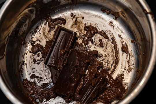 Melting Chocolate In A Saucepan. Melt Chocolate. Top View Of A Melting Chocolate Bar