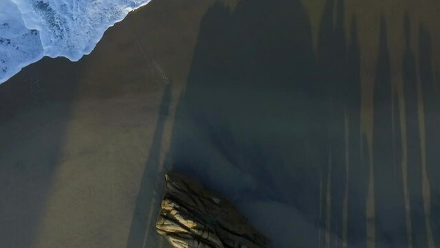 natives walking to ceremony on the beach, of the park tayrona colombia