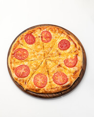 Traditional Italian pizza Margarita with mozzarella and tomatoes. Italian food. Isolate on white background. Vegetarian dish. Copy space. Top view.