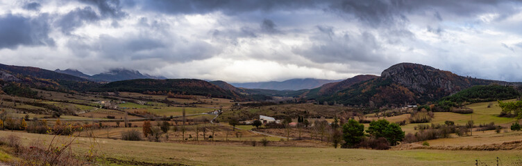 Panoramic View of Farm Fields and Mountain Landscape. Comps-sur-Artuby, France, Europe. Cloudy Sky