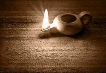 Ancient lamp shines in the dark