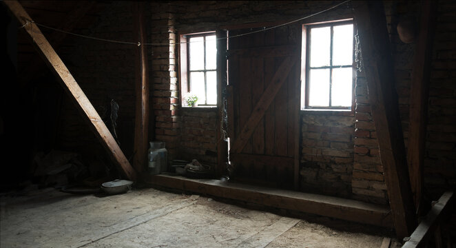 Old windows and door in the attic
