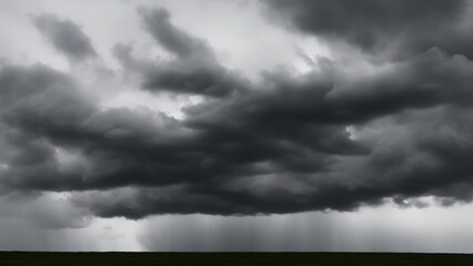 Obraz na płótnie Canvas Dark ominous grey storm clouds - dramatic sky.