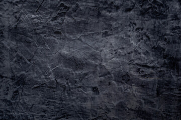Interesting surface. Loft style black concrete wall background. Texture.