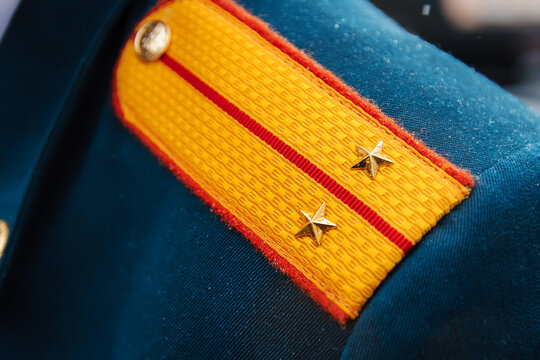 Shoulder straps of Russian military police officers on a form close-up