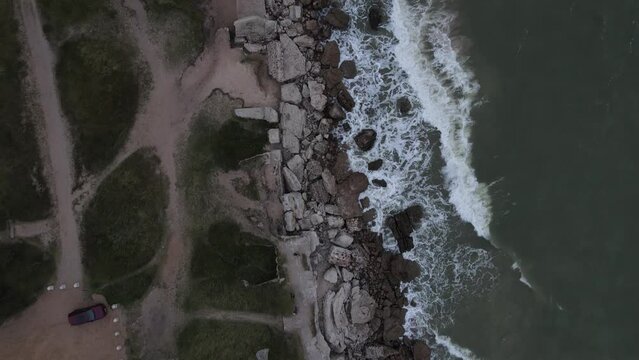 Top view of the beautiful rocky shore of Baltic Sea in Liepaja, Latvia, 4k