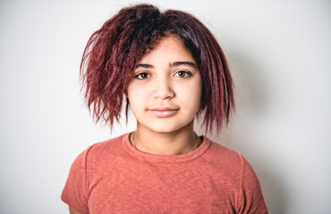 portrait of beautiful American teen over studio background