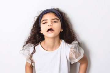 curly dark hair child girl over white background