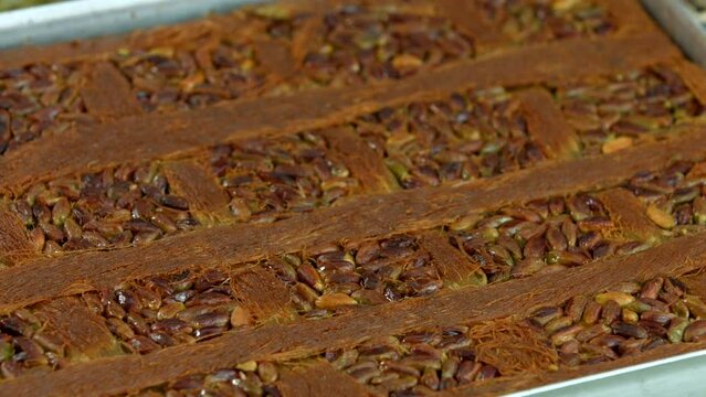 Traditional turkish baklava pistachio pastry. Dilberdudagi, ozel kesim baklava, cikolatali baklava, fistikli baklava, katmer, fistikli kadayif, kattafi, fistik sarma, soguk baklava, midye baklava, cev