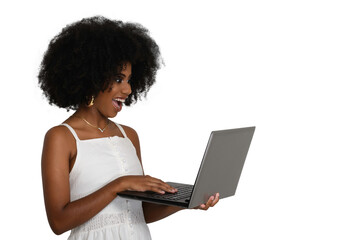 young woman looks at camputer laptop screen and smiles, black woman